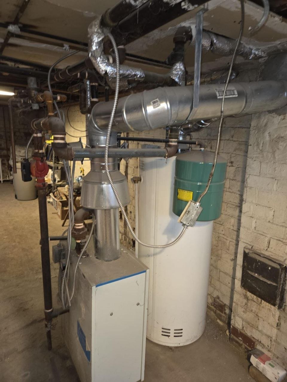 Commercial boiler room water tank and insulated piping Toronto